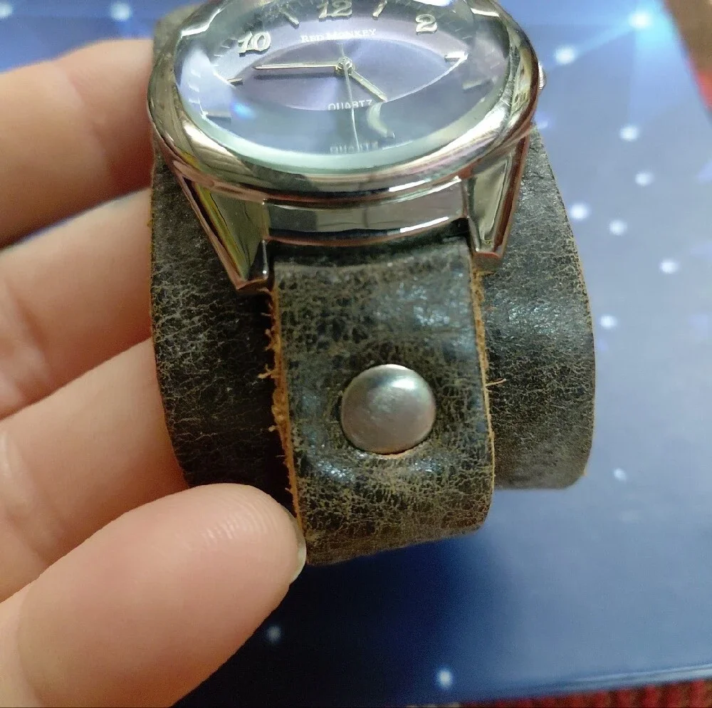 Red Monkey Blue Dial Watch on Brown Leather Cuff